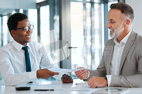 Image of Human resources, interview and hiring with a business man and candidate for a vacancy meeting in an office. Manager, recruitment and contract opportunity with an employee handing a cv or resume to hr