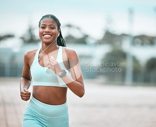 Image of Portrait, outdoor and black woman running, exercise and training for wellness, health and self care. Face, female person or runner with earphones, workout goal and athlete with music, smile or cardio