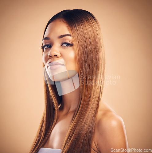 Image of Beauty, hair care and portrait of woman in studio for wellness, keratin treatment and texture. Salon, hairdresser aesthetic and face of female person on brown background for growth, shine and glow