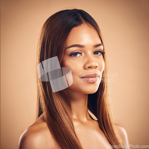 Image of Beauty, hair and portrait of woman for wellness, keratin treatment and haircare aesthetic in studio. Salon, hairdresser and face of female person on brown background for growth, shine and texture