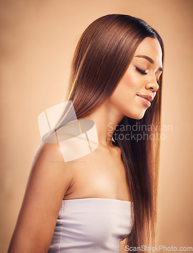 Image of Beauty, hair and face profile of woman in studio for wellness, keratin treatment and haircare aesthetic. Salon, hairdresser and happy female person on brown background for growth, shine and texture