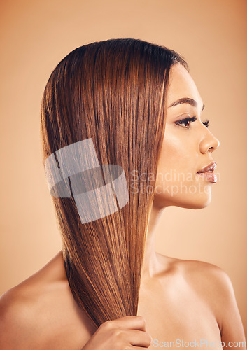 Image of Woman, hair and beauty with hairstyle and profile, haircare and keratin treatment isolated on studio background. Female model with highlights, color and cosmetic care, texture and growth with shine