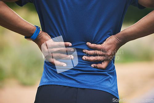 Image of Back pain, fitness and hands of man in park after workout, exercise and training or running outdoors. Medical emergency, health and closeup of male person with muscle strain, injury or hurt in nature