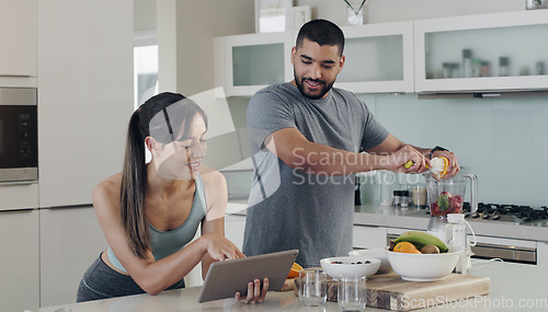 Image of Health smoothie, couple and tablet with recipe with nutritionist fruit, healthy food and smile at home. Nutrition, breakfast and web of a woman and man together with juice blender and diet in kitchen