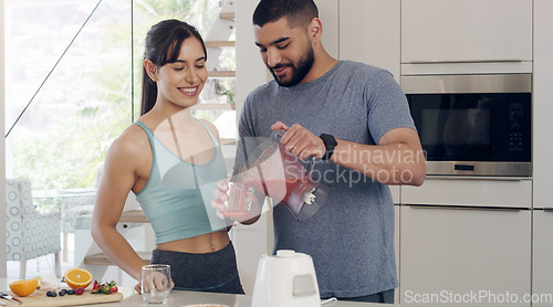 Image of Health smoothie, couple and fitness nutritionist with fruit, healthy food and smile at home. Nutrition, breakfast and diet of a woman and man together with juice blender and happiness from cooking