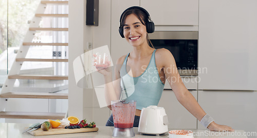 Image of Blender, smoothie or portrait of a happy woman for diet, detox or healthy breakfast fruits in kitchen. Headphones or fit girl smiling with natural drink, protein shake or vegan juice for nutrition