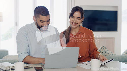 Image of Laptop, savings and couple planning a budget for bills, debt or mortgage payments together in the living room. Technology, finance documents and young man and woman paying with online banking at home