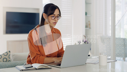 Image of Woman, remote work and typing at laptop in home for digital planning, online research and information at table. Female freelancer working on computer technology, internet and pc connection for blog