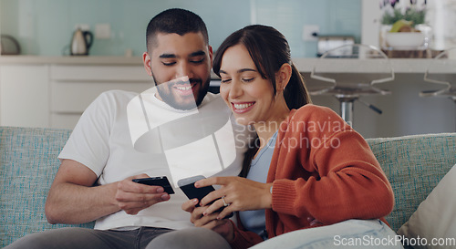 Image of Couple, credit card and online shopping on smartphone in home for digital payment, fintech and money app. Happy man, woman and mobile banking for easy finance, website sales and password of account