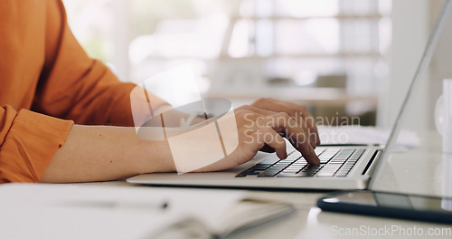 Image of Hands, woman and laptop keyboard at table for planning, online research and blog on internet. Closeup, computer and typing on technology for website connection, email and digital copywriting at desk