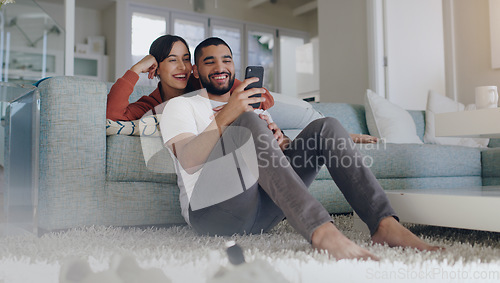 Image of Phone, happy and couple on sofa in home for social media, online website and internet news. Communication, relationship and man and woman relax on smartphone for quality time, bonding and network