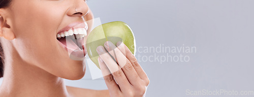 Image of Mockup, apple bite or woman eating in studio on white background for healthy nutrition or clean diet. Closeup, space on banner or open mouth of hungry girl marketing natural green fruit for wellness