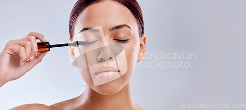 Image of Eyelash extension, mockup or girl with mascara makeup, cosmetics or product brush for grooming in studio. Beauty, mock up space or beautiful woman with eyelashes tool for make up on white background