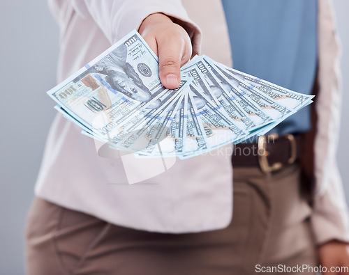 Image of Money, offer and woman hands isolated on a studio background for winning, cash success or finance loan. Lottery, banking and business person or winner giving bonus, wealth or financial profit choice