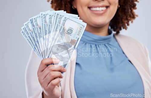 Image of Money, fan and happy woman hands isolated on a studio background for winning, cash success or finance loan. Lottery, bank and business person or winner investment bonus, lottery or financial freedom