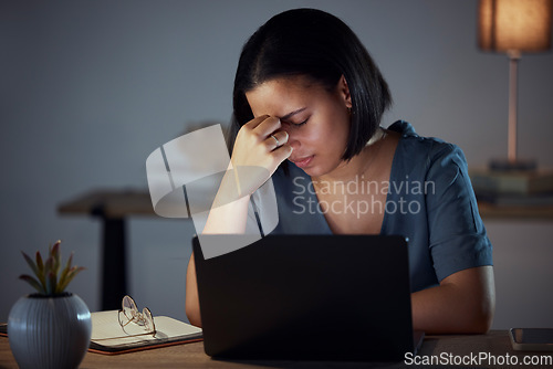 Image of Woman, laptop and frustrated in night at office with glitch, 404 error and burnout at information technology job. IT expert, anxiety and fatigue in dark workplace with computer, headache and stress