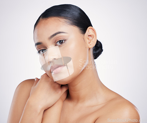 Image of Skin, face and beauty of a woman in studio for glow, dermatology and cosmetics. Portrait of aesthetic female person with natural shine, facial self care or health and wellness on a white background