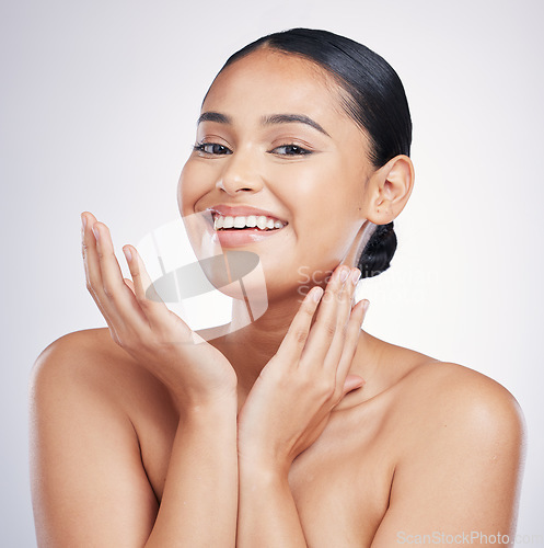 Image of Natural beauty, smile and face of a woman in studio for glow, dermatology or cosmetics. Portrait of a happy aesthetic model person with self care, facial or skincare results on a white background