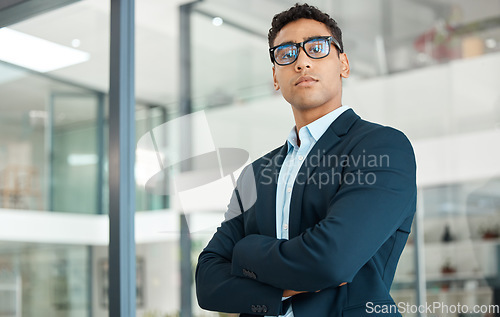 Image of Business man, serious portrait and arms crossed with startup and company ceo in a office. Vision, professional and expert with boss confidence and corporate focus ready for working as a executive