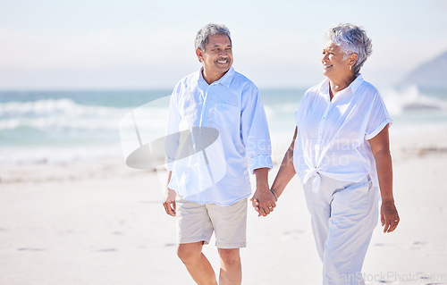 Image of Holding hands, beach or happy old couple walking in summer with happiness, trust or romance. Lovers, smile or senior man enjoying bonding time with mature woman taking a walk on sand at sea or ocean