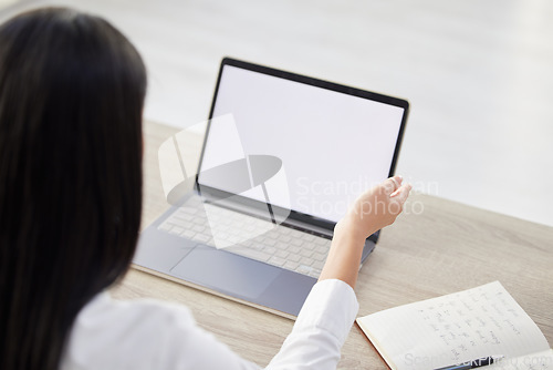 Image of Above of unknown mixed race hiring manger typing on laptop in office CEO sitting alone and using technology, paperwork to search for applicant for job opening, vacancy, office opportunity. Hr boss