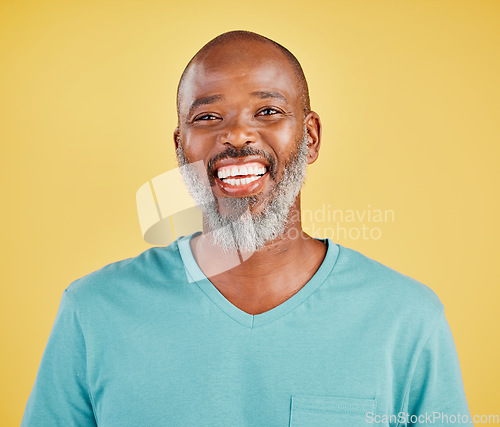 Image of Mature african man, laugh and studio portrait with happiness, comic and funny by yellow background. Senior model, happy and smile with excited face, fashion and t-shirt with confidence by backdrop