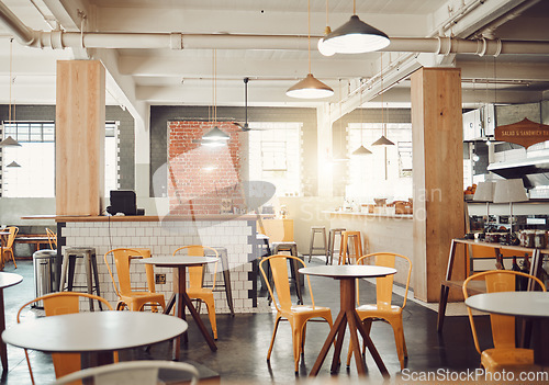 Image of Empty, interior design of modern restaurant and open space with a lens flare during the day. Decoration, lights and luxury furniture for fine dining and set up of cafe or coffee shop in the city