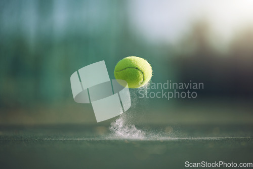 Image of Sports, tennis and a ball bouncing on a court outdoor during a game, competition or training with chalk. Fitness, exercise and club with still life sport equipment outside for a workout or match