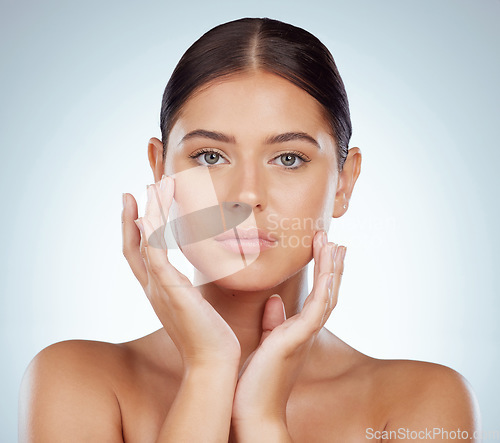 Image of Serious face, skincare and beauty of woman in studio isolated on a white background. Portrait, natural and female model in makeup, cosmetics or facial treatment for skin health, aesthetic or wellness