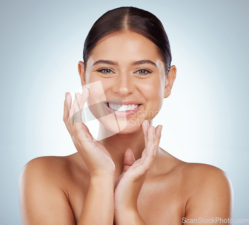 Image of Face, skincare and beauty of happy woman in studio isolated on a white background. Portrait, natural and female model in makeup, cosmetics or facial treatment for skin health, aesthetic or wellness.