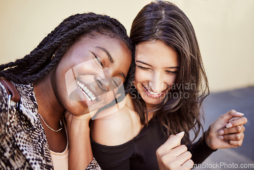Image of Girl friends, laugh and happiness outdoor with funny joke and smile from love and support. Comedy, women and happy young people with diversity in town laughing with street fashion and friendship