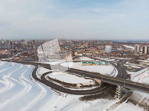 Image of Aerial shot of bridge and car driving on the bridge