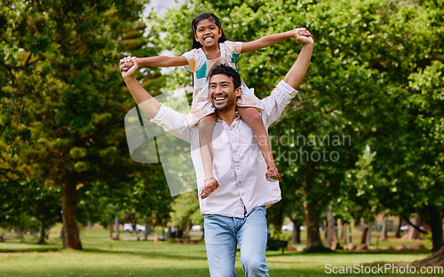Image of Indian dad, daughter and shoulders in park with smile, airplane game or piggyback in nature on holiday. Man, girl and playing together in garden, woods and summer sunshine for happy family vacation