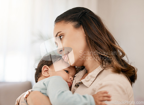 Image of Family, love and mother carry baby for bonding, quality time and loving embrace together at home. New born, motherhood and calm mom holding infant for care, support and affection in living room