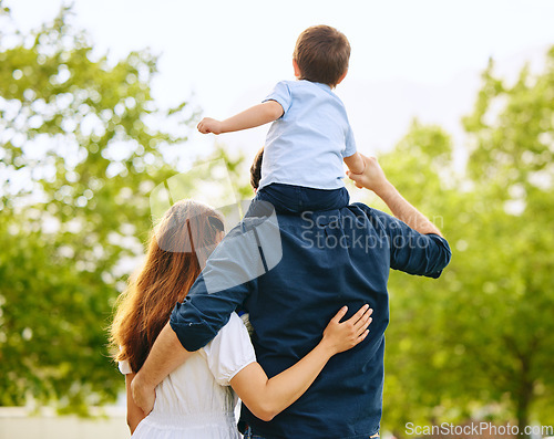 Image of Dad, son and girl in park with back, hug and sitting on shoulders with care, love and walk together in summer. Man, young children and embrace with piggyback, trees and forrest with bond on holiday