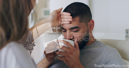 Image of Sick, fever and tea with couple in bedroom for problem, medical and illness recovery. Relax, love and care with man and woman helping in bed at home for virus, fatigue and disease treatment