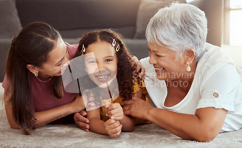 Image of Happy, generations and relax with family on floor of living room for bonding, smile and love. Happiness, trust and grandmother with young child and mom at home for solidarity, support and weekend