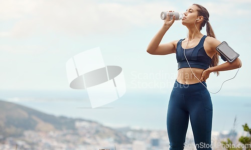 Image of Fitness, relax, woman with drinking water and hiking in nature mockup for health and wellness during exercise. Music, bottle and fit girl on hike in park with phone, earphones and radio or podcast.