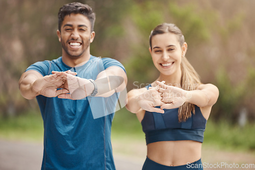 Image of Stretching arms, portrait and couple of friends in the mountain for outdoor exercise. Training, wellness balance and young people smile with leg stretch for fitness run, sports and workout on a road