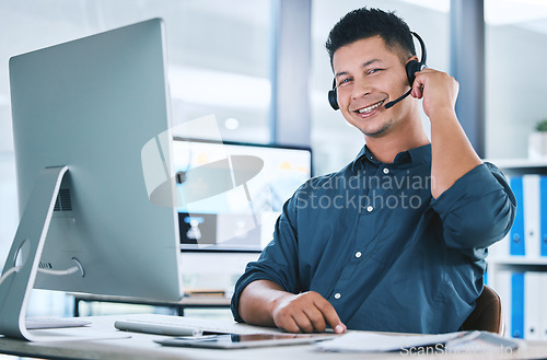 Image of Call center, customer service and portrait of a man at a computer with a headset for contact us communication. Crm, telemarketing and sales or happy technical support agent or consultant person at pc