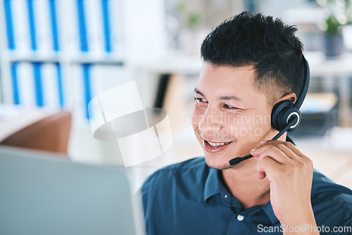 Image of Call center, customer service and a man talking on a microphone for contact us communication. Face of person as crm, telemarketing and sales or technical support agent with a headset and computer