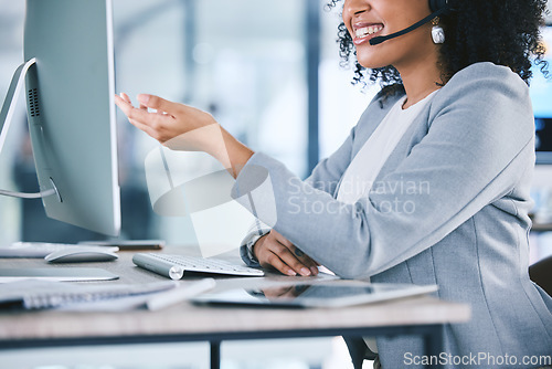 Image of Call center, customer service and a woman talking at computer with microphone. Hand and smile of african person as crm, telemarketing and sales or technical support agent with headset and desktop pc