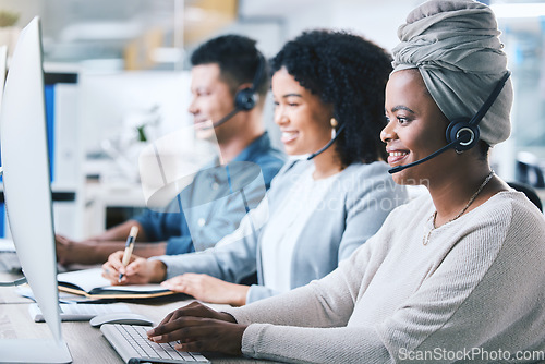 Image of Customer service, call center and a team at computer with a headset for contact us website. Black woman and employees as crm, telemarketing or sales support agent with headphones, smile and desktop
