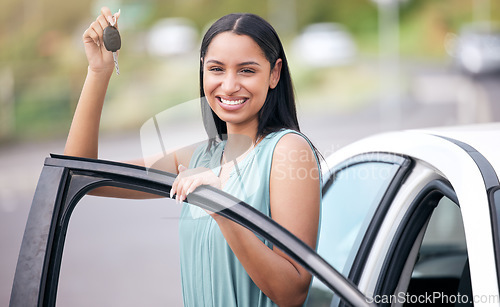 Image of Portrait of happy woman driver with new car, key and smile on face with loan, auto insurance and standing at door. Happiness, freedom to drive and customer with keys for motor vehicle in city street.