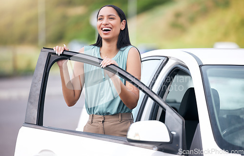 Image of Excited, woman and outdoor with happiness driving her new car on a road for commute. Female person, happy purchase and first test drive with vehicle insurance and freedom on a street from work travel