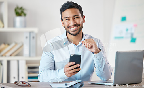 Image of Happy, phone and portrait of business man in a office with startup and technology. Motivation, smile and happiness of businessman with insurance agency work with mobile text and development at job