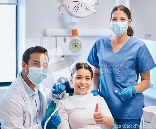 Image of Portrait of dentist, thumbs up and patient in consultation for teeth whitening, service and dental care. Orthodontist, dentistry and woman with thank you sign for oral hygiene, healthcare or cleaning