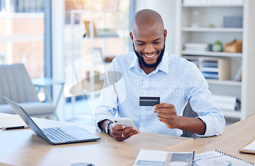 Image of Black man, corporate credit card and smartphone with ecommerce and fintech, payment with smile and bank app. Male professional at office with business purchase, online shopping and internet banking