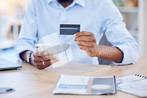 Image of Black man, hands with credit card and smartphone for ecommerce and fintech, corporate payment and bank app. Male professional at office with business purchase, online shopping and internet banking