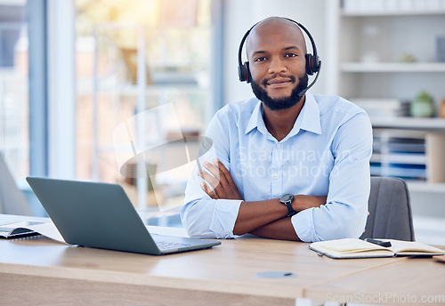 Image of Black man, portrait and callcenter with arms crossed and contact us, communication with headset and CRM. Male consultant with smile, customer service or telemarketing with confidence and help desk